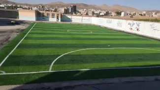 چمن مصنوعی فوتبالی مدرسه شهید اسکندری الیگودرز